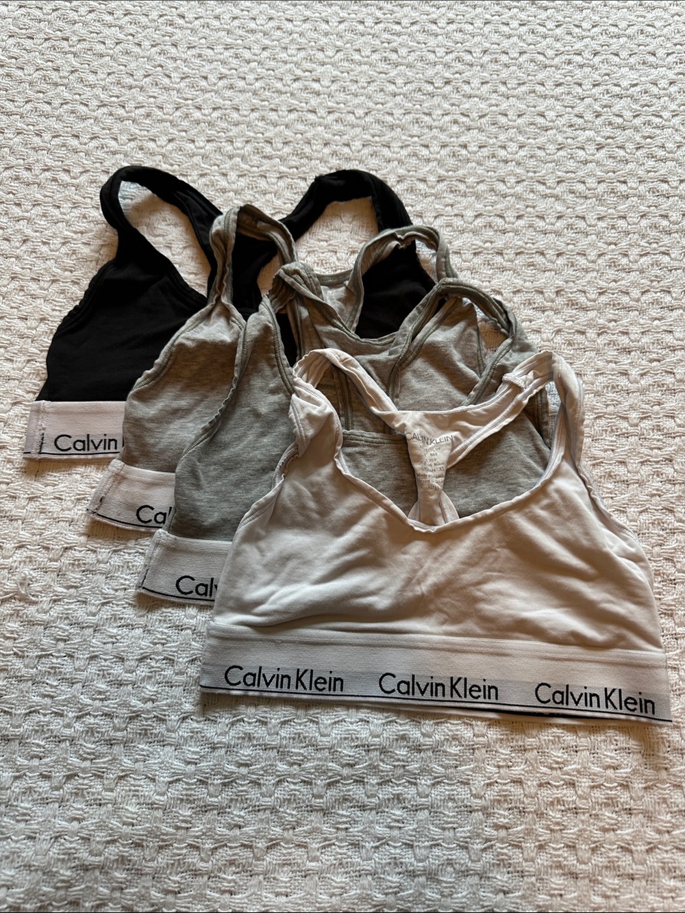 Calvin Klein 4-Pack Logo Bralette Set — Black, Gray, Gray, Cream